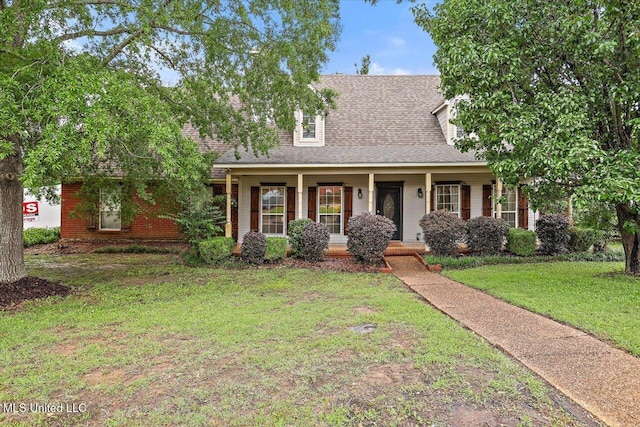 501 Brighton Cir, Brandon, MS 39047 - cape cod-style house with a porch, a front lawn, and a shingled roof