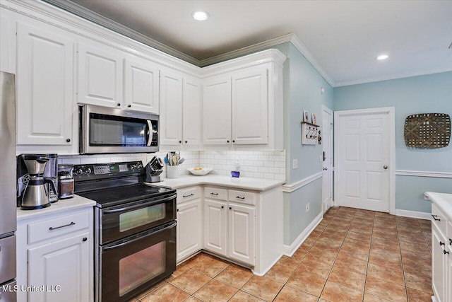 501 Brighton Cir, Brandon, MS 39047 - kitchen with stainless steel appliances, decorative backsplash, ornamental molding, white cabinetry, and light countertops