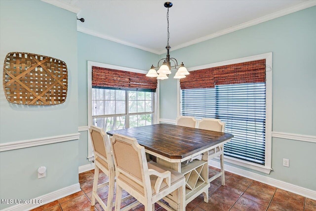501 Brighton Cir, Brandon, MS 39047 - tiled dining area featuring a chandelier, baseboards, and ornamental molding