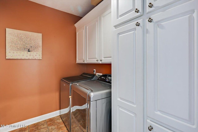 501 Brighton Cir, Brandon, MS 39047 - washroom featuring cabinet space, separate washer and dryer, baseboards, and tile patterned floors