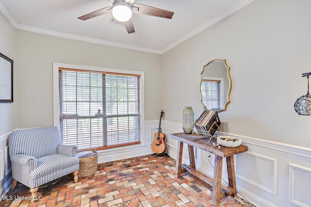 501 Brighton Cir, Brandon, MS 39047 - living area with brick floors, ornamental molding, a ceiling fan, and wainscoting