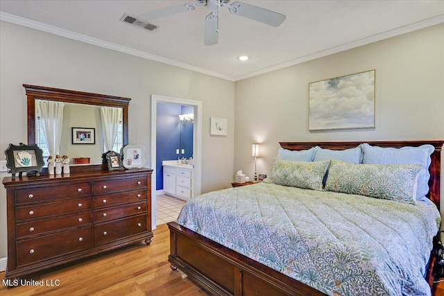 501 Brighton Cir, Brandon, MS 39047 - bedroom featuring light wood-type flooring, crown molding, connected bathroom, ceiling fan, and recessed lighting