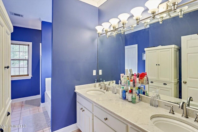 501 Brighton Cir, Brandon, MS 39047 - full bath with tile patterned floors, double vanity, baseboards, and a tub to relax in