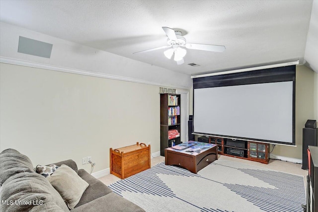 501 Brighton Cir, Brandon, MS 39047 - home theater featuring carpet, a ceiling fan, baseboards, and lofted ceiling