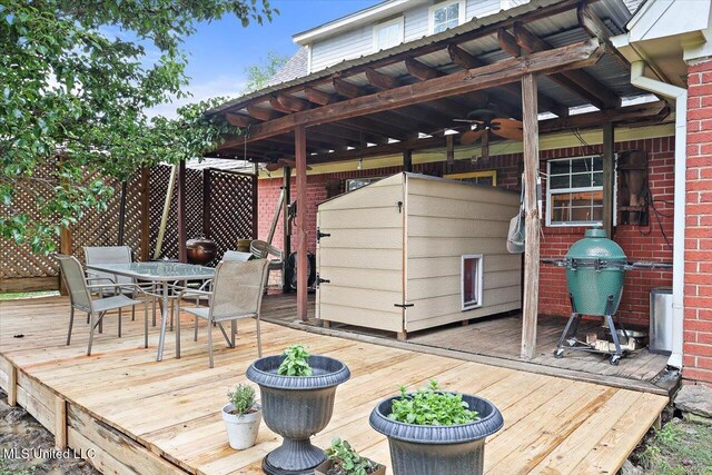501 Brighton Cir, Brandon, MS 39047 - wooden deck with outdoor dining space and a ceiling fan