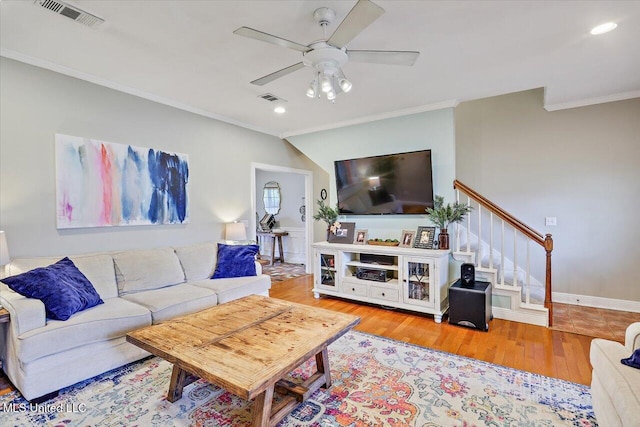 501 Brighton Cir, Brandon, MS 39047 - living area featuring ornamental molding, a ceiling fan, wood finished floors, stairway, and recessed lighting