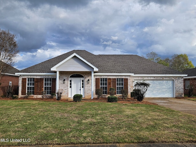 ranch-style home featuring a garage and a front lawn