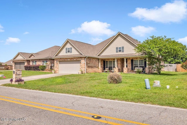 craftsman-style home with fence, an attached garage, brick siding, a front yard, and concrete driveway