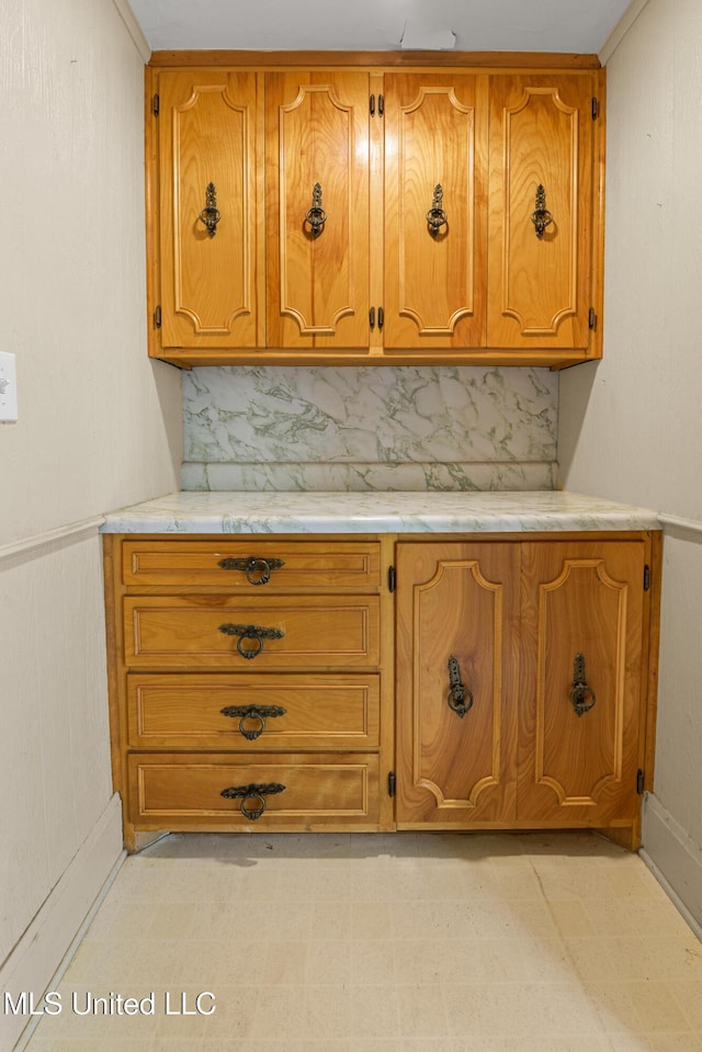 2418 24th Ave, Meridian, MS 39301 - detailed view of decorative backsplash and tile patterned floors