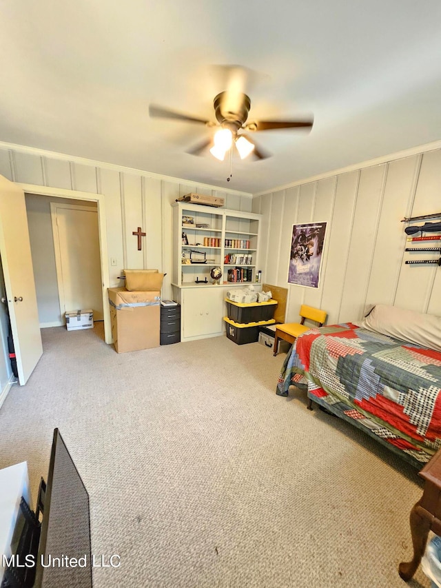 bedroom with carpet, a closet, and ceiling fan