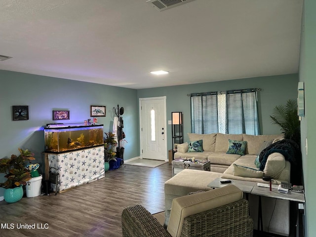 living room with hardwood / wood-style flooring