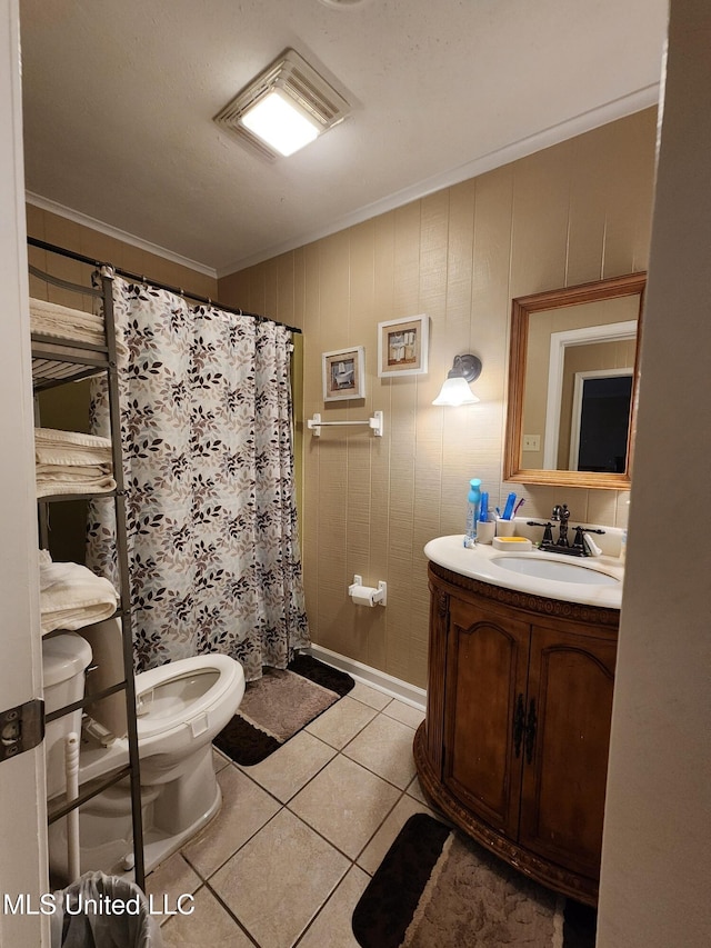 1365 Bruister Rd, Tutwiler, MS 38963 - full bath with toilet, crown molding, vanity, tile patterned flooring, and a shower with shower curtain