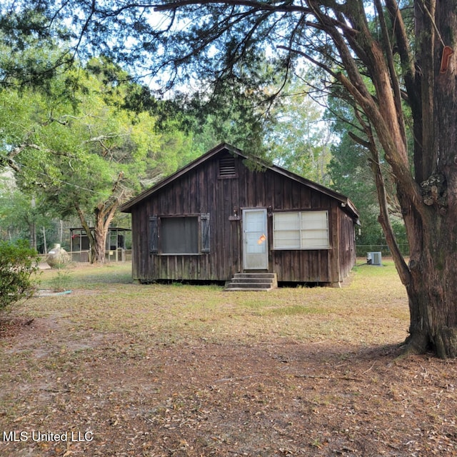 view of outbuilding with central air condition unit