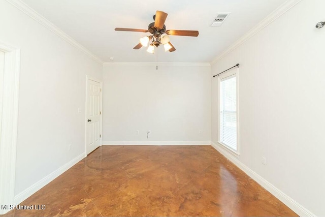 spare room featuring ornamental molding and ceiling fan