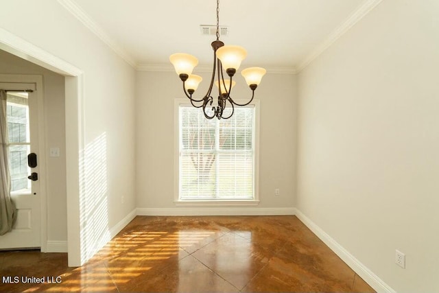 unfurnished dining area with dark tile patterned floors, crown molding, and a notable chandelier