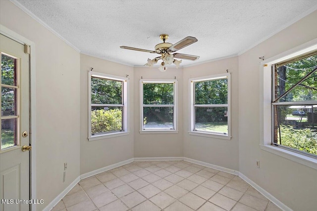626 N Lexington St, Durant, MS 39063 - spare room with a ceiling fan, a textured ceiling, plenty of natural light, crown molding, and light tile patterned floors