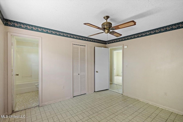 626 N Lexington St, Durant, MS 39063 - unfurnished bedroom with baseboards, a closet, ensuite bathroom, a ceiling fan, and a textured ceiling