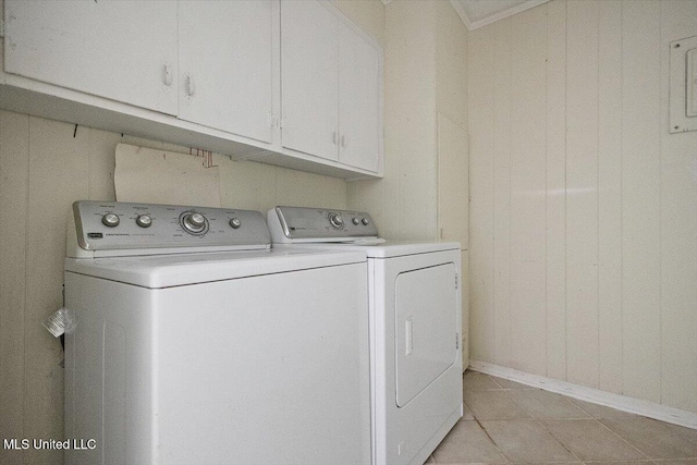 626 N Lexington St, Durant, MS 39063 - laundry room with independent washer and dryer, cabinet space, baseboards, and light tile patterned floors