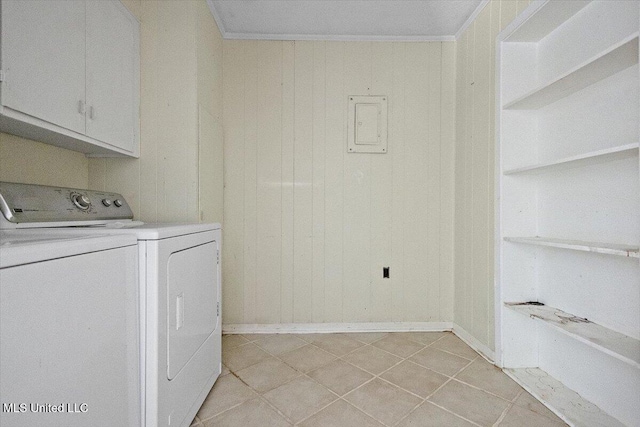 626 N Lexington St, Durant, MS 39063 - washroom with cabinet space, washing machine and dryer, light tile patterned flooring, built in shelves, and ornamental molding