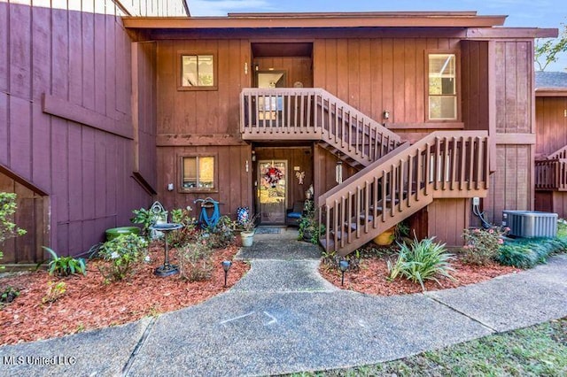 doorway to property with central air condition unit