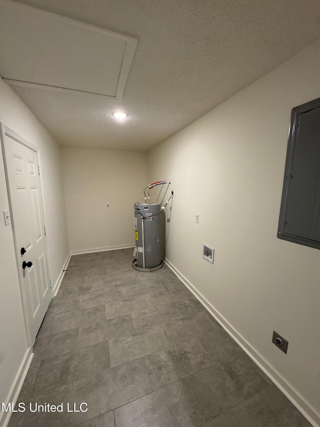 laundry room featuring washer hookup, a textured ceiling, electric dryer hookup, water heater, and electric panel