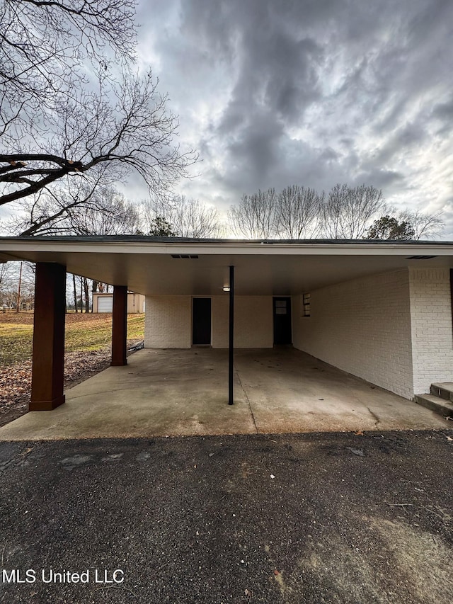 view of parking featuring a carport