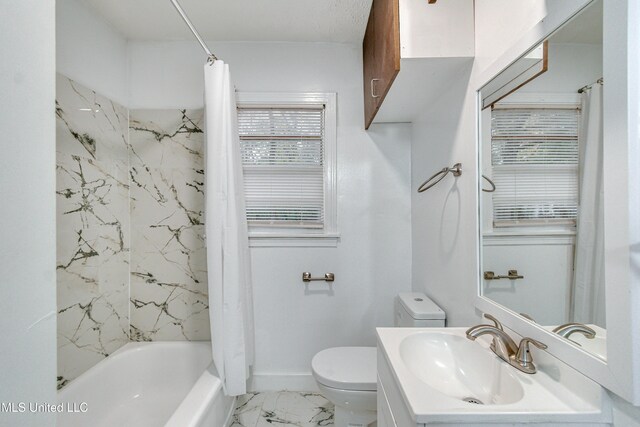 full bathroom with vanity, toilet, and shower / bath combo with shower curtain