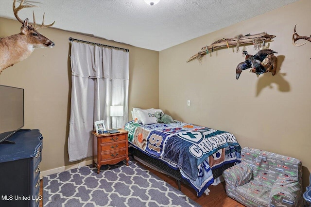 bedroom with a textured ceiling