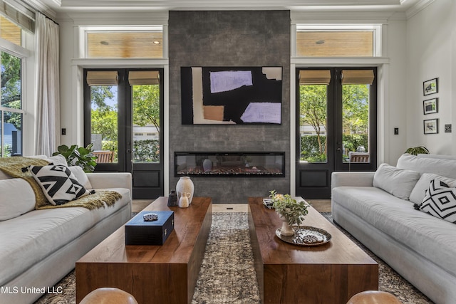 1511 18th Ave, Gulfport, MS 39501 - living area featuring crown molding, a large fireplace, and plenty of natural light