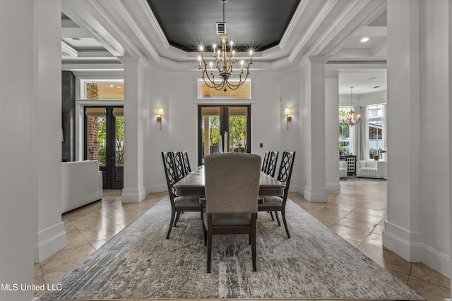 1511 18th Ave, Gulfport, MS 39501 - dining room featuring a chandelier, a tray ceiling, ornate columns, crown molding, and tile patterned floors