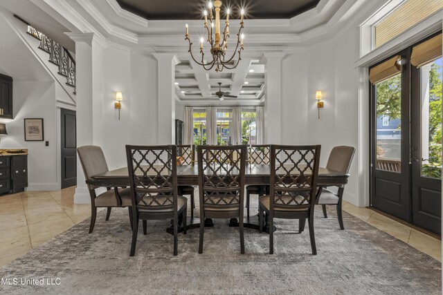 1511 18th Ave, Gulfport, MS 39501 - dining room featuring tile patterned floors, crown molding, a chandelier, healthy amount of natural light, and a tray ceiling