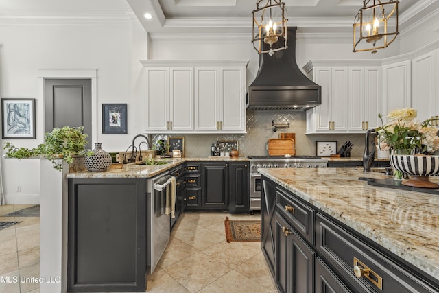 1511 18th Ave, Gulfport, MS 39501 - kitchen featuring a chandelier, custom exhaust hood, white cabinetry, a sink, and appliances with stainless steel finishes