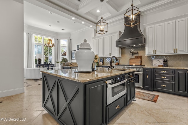 1511 18th Ave, Gulfport, MS 39501 - kitchen featuring white cabinets, a sink, premium range hood, ornamental molding, and a chandelier