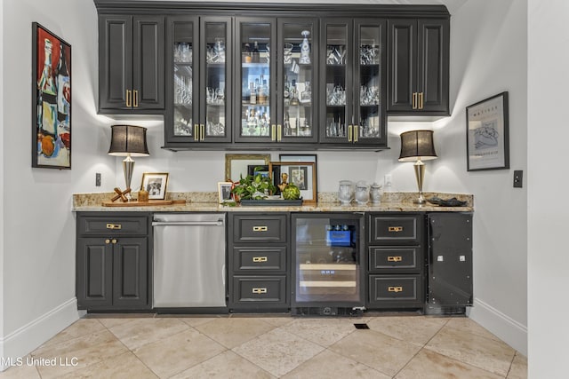 1511 18th Ave, Gulfport, MS 39501 - indoor wet bar featuring dishwasher, baseboards, light tile patterned floors, and beverage cooler