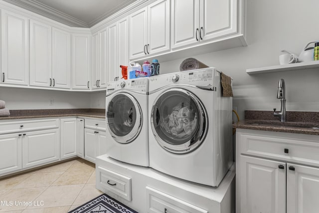 1511 18th Ave, Gulfport, MS 39501 - laundry area with cabinet space, separate washer and dryer, and light tile patterned flooring