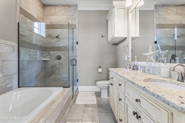 1511 18th Ave, Gulfport, MS 39501 - bathroom with double vanity, a shower stall, ornamental molding, a garden tub, and baseboards
