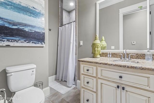 1511 18th Ave, Gulfport, MS 39501 - full bathroom featuring toilet, vanity, a shower with curtain, baseboards, and tile patterned floors