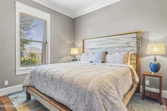 1511 18th Ave, Gulfport, MS 39501 - bedroom featuring baseboards, ornamental molding, and wood finished floors
