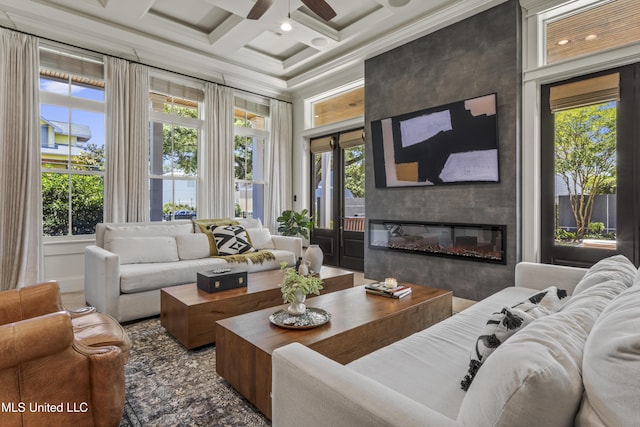 1511 18th Ave, Gulfport, MS 39501 - living room featuring a ceiling fan, a fireplace, coffered ceiling, and beam ceiling