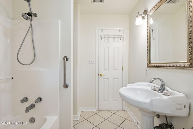 bathroom featuring shower / bathing tub combination and tile patterned floors