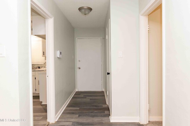 hall featuring dark hardwood / wood-style flooring