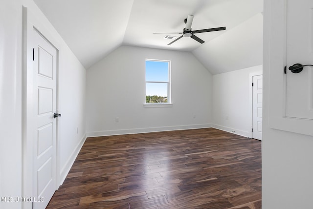 bonus room with dark wood-type flooring, ceiling fan, and vaulted ceiling