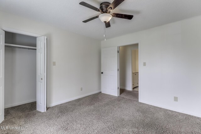 115 Shady Dr, Long Beach, MS 39560 - unfurnished bedroom featuring carpet floors, a closet, and ceiling fan