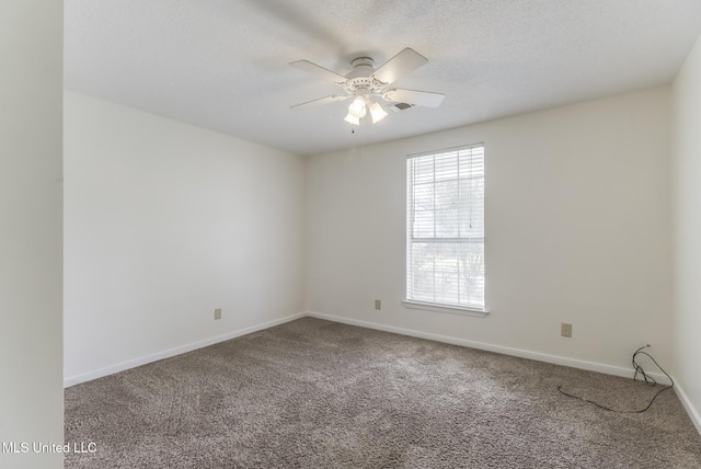 115 Shady Dr, Long Beach, MS 39560 - empty room with carpet flooring, a ceiling fan, and a textured ceiling