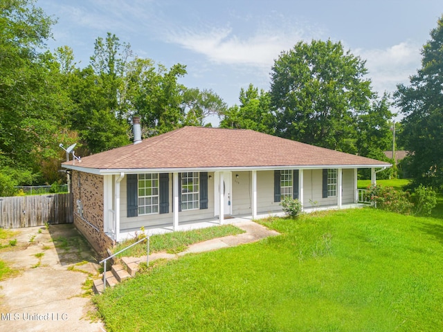 115 Shady Dr, Long Beach, MS 39560 - view of front of house with a porch, roof with shingles, and brick siding