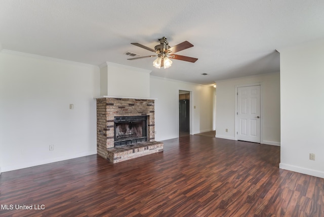 115 Shady Dr, Long Beach, MS 39560 - unfurnished living room featuring a ceiling fan, wood finished floors, a brick fireplace, and ornamental molding