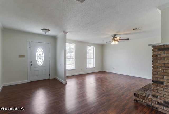 115 Shady Dr, Long Beach, MS 39560 - entryway featuring ceiling fan, wood finished floors, and a textured ceiling