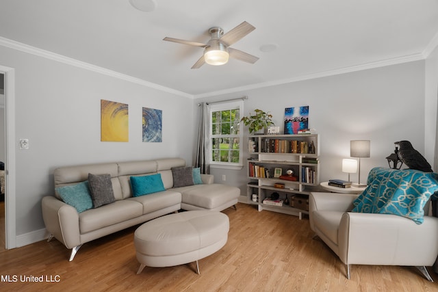 living room with crown molding, light wood-type flooring, and ceiling fan