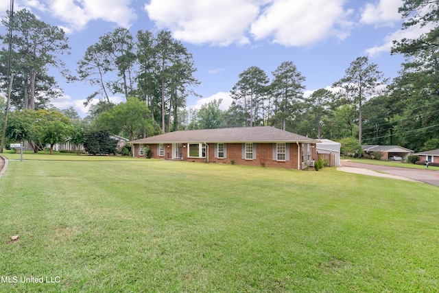 ranch-style house with a front yard