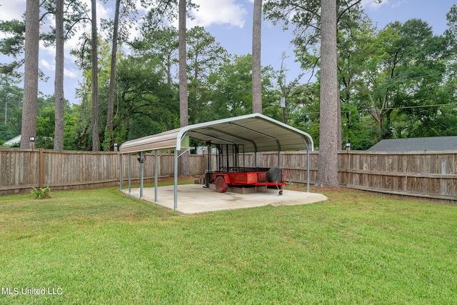 view of yard with a carport